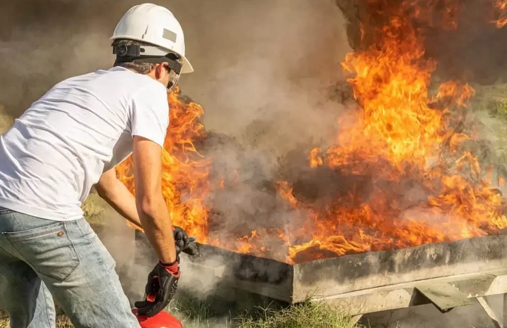 man-using-a-fire-extinguisher-1024x682