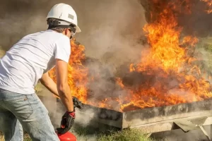 man-using-a-fire-extinguisher-1024x682